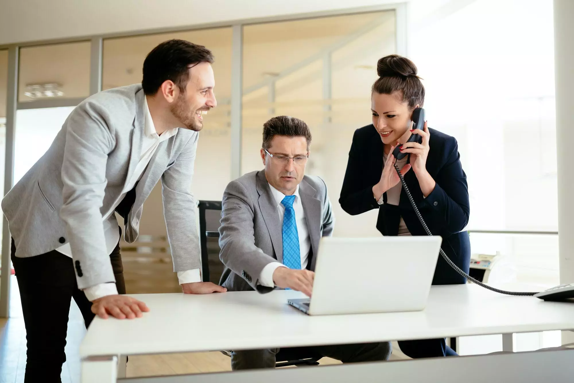 secretaries-assisting-boss-at-business.jpg